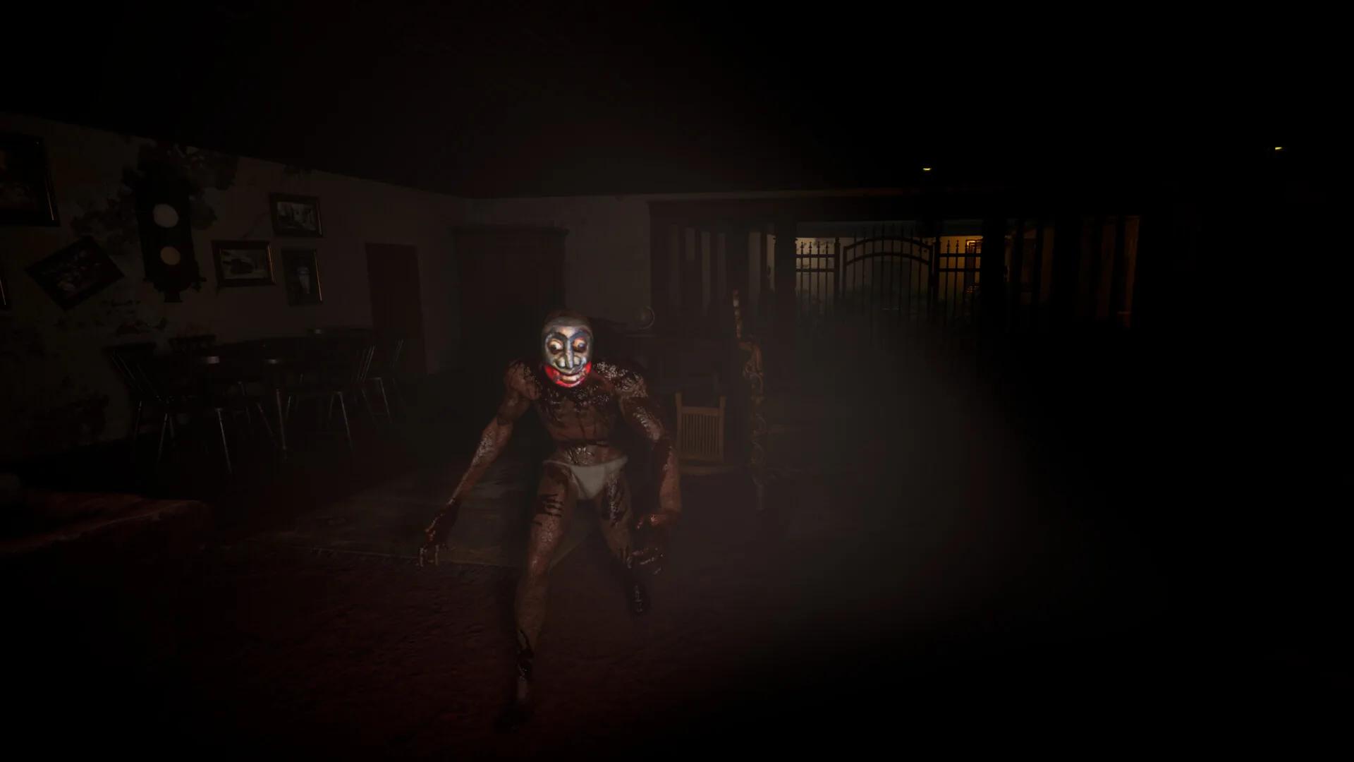Masked entity inside a dark room